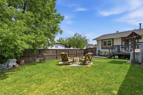 865 Queensland Drive Se, Calgary, AB - Outdoor With Deck Patio Veranda