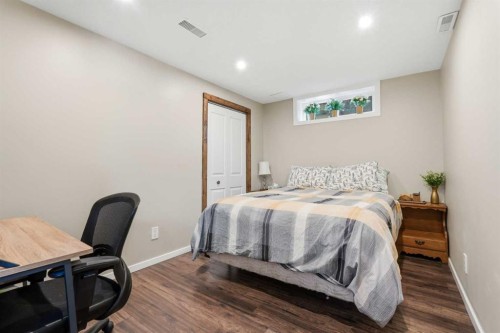 865 Queensland Drive Se, Calgary, AB - Indoor Photo Showing Bedroom