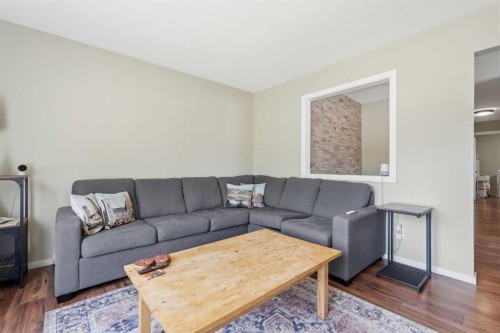 865 Queensland Drive Se, Calgary, AB - Indoor Photo Showing Living Room