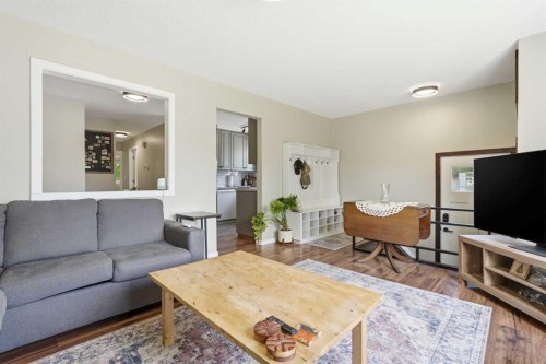 865 Queensland Drive Se, Calgary, AB - Indoor Photo Showing Living Room