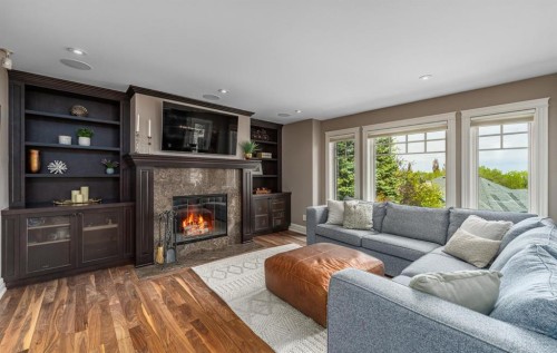 67 Sienna Hills View Sw, Calgary, AB - Indoor Photo Showing Living Room With Fireplace
