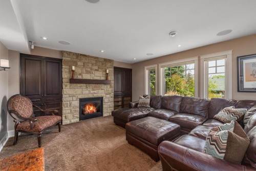 67 Sienna Hills View Sw, Calgary, AB - Indoor Photo Showing Living Room With Fireplace