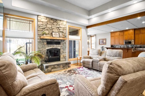 2 Harrison Green, Olds, AB - Indoor Photo Showing Living Room With Fireplace