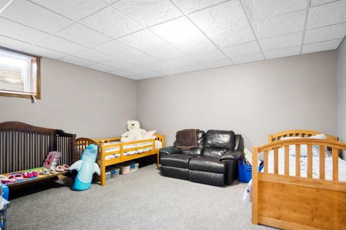 2 Harrison Green, Olds, AB - Indoor Photo Showing Bedroom
