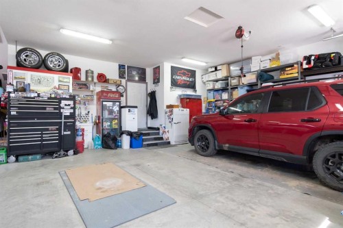 2 Harrison Green, Olds, AB - Indoor Photo Showing Garage