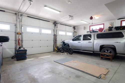 2 Harrison Green, Olds, AB - Indoor Photo Showing Garage