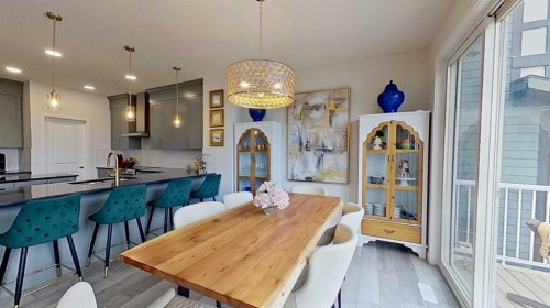 168 Magnolia Manor Se, Calgary, AB - Indoor Photo Showing Dining Room