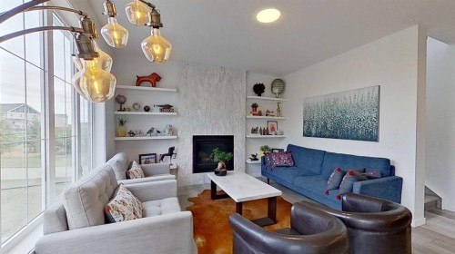 168 Magnolia Manor Se, Calgary, AB - Indoor Photo Showing Living Room