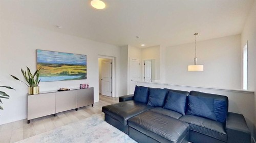 168 Magnolia Manor Se, Calgary, AB - Indoor Photo Showing Living Room