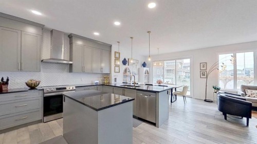 168 Magnolia Manor Se, Calgary, AB - Indoor Photo Showing Kitchen With Upgraded Kitchen