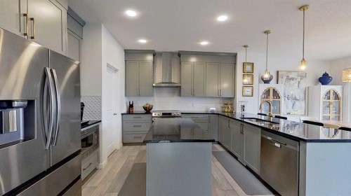 168 Magnolia Manor Se, Calgary, AB - Indoor Photo Showing Kitchen With Upgraded Kitchen