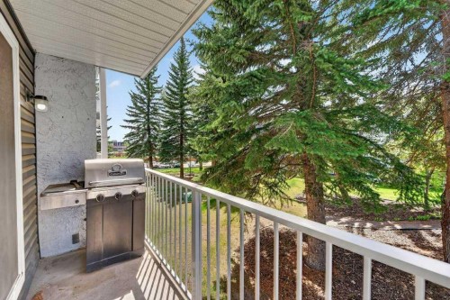 202A-5601 Dalton Drive Nw, Calgary, AB - Outdoor With Balcony With Exterior