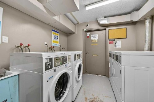 202A-5601 Dalton Drive Nw, Calgary, AB - Indoor Photo Showing Laundry Room