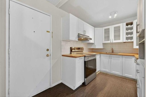 202A-5601 Dalton Drive Nw, Calgary, AB - Indoor Photo Showing Kitchen