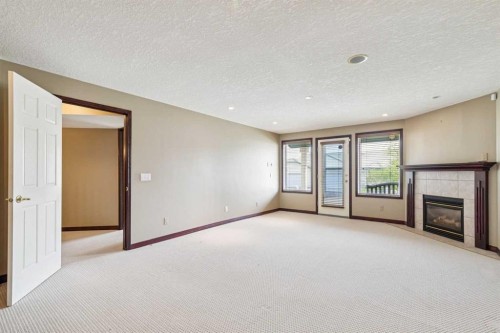 14 Strathearn Gardens Sw, Calgary, AB - Indoor With Fireplace