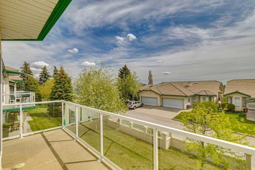 14 Strathearn Gardens Sw, Calgary, AB - Outdoor With Balcony