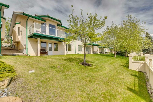 14 Strathearn Gardens Sw, Calgary, AB - Outdoor With Balcony