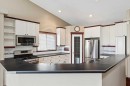 14 Strathearn Gardens Sw, Calgary, AB  - Indoor Photo Showing Kitchen With Stainless Steel Kitchen 