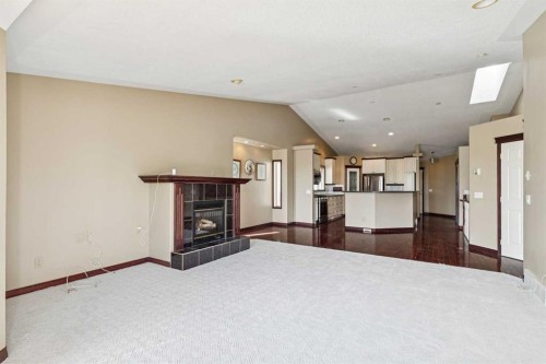 14 Strathearn Gardens Sw, Calgary, AB - Indoor With Fireplace
