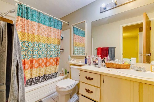 864 Queensland Drive Se, Calgary, AB - Indoor Photo Showing Bedroom