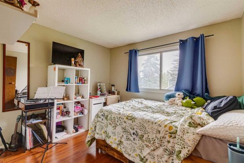 864 Queensland Drive Se, Calgary, AB - Indoor Photo Showing Bedroom