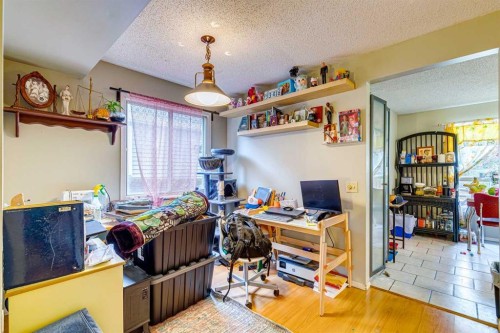 864 Queensland Drive Se, Calgary, AB - Indoor Photo Showing Living Room