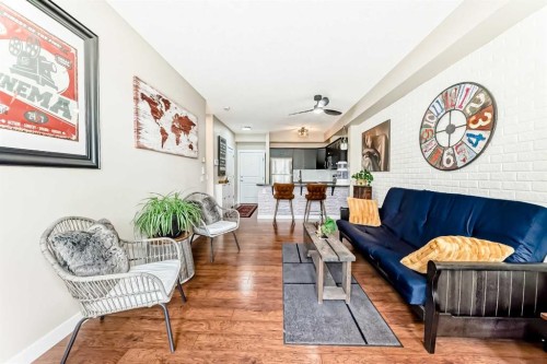 2105-211 Aspen Stone Boulevard Sw, Calgary, AB - Indoor Photo Showing Living Room
