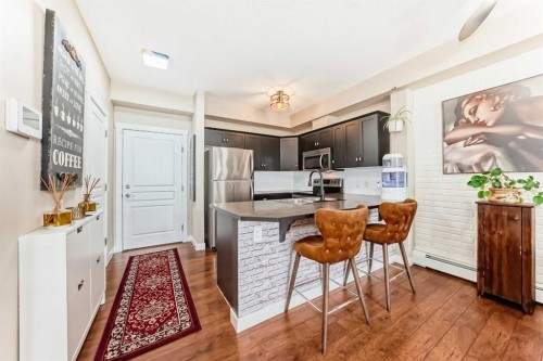 2105-211 Aspen Stone Boulevard Sw, Calgary, AB - Indoor Photo Showing Kitchen