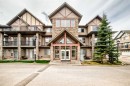 2105-211 Aspen Stone Boulevard Sw, Calgary, AB  - Outdoor With Facade 