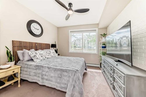 2105-211 Aspen Stone Boulevard Sw, Calgary, AB - Indoor Photo Showing Bedroom