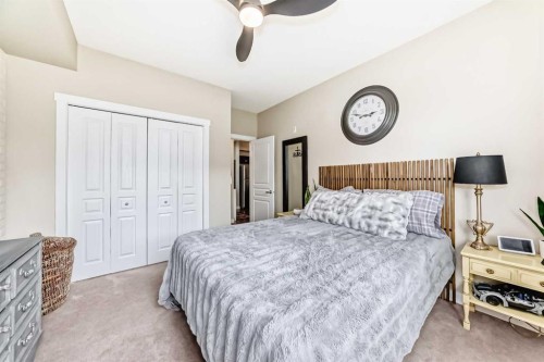 2105-211 Aspen Stone Boulevard Sw, Calgary, AB - Indoor Photo Showing Bedroom