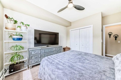 2105-211 Aspen Stone Boulevard Sw, Calgary, AB - Indoor Photo Showing Bedroom