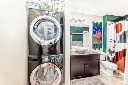 2105-211 Aspen Stone Boulevard Sw, Calgary, AB - Indoor Photo Showing Laundry Room