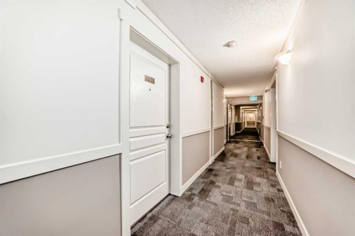 2105-211 Aspen Stone Boulevard Sw, Calgary, AB - Indoor Photo Showing Other Room