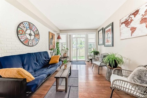 2105-211 Aspen Stone Boulevard Sw, Calgary, AB - Indoor Photo Showing Living Room