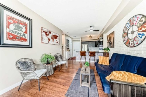 2105-211 Aspen Stone Boulevard Sw, Calgary, AB - Indoor Photo Showing Living Room