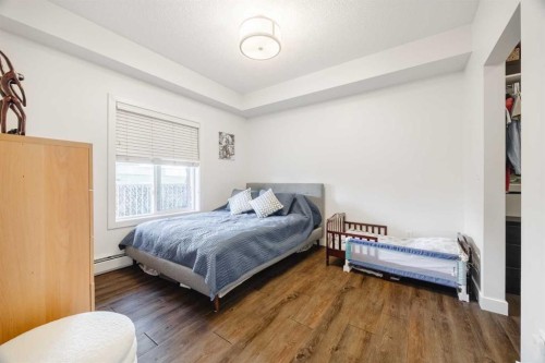 105-110 Auburn Meadows View Se, Calgary, AB - Indoor Photo Showing Bedroom