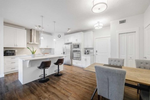 105-110 Auburn Meadows View Se, Calgary, AB - Indoor Photo Showing Kitchen With Upgraded Kitchen