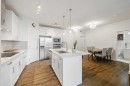 105-110 Auburn Meadows View Se, Calgary, AB  - Indoor Photo Showing Kitchen With Upgraded Kitchen 