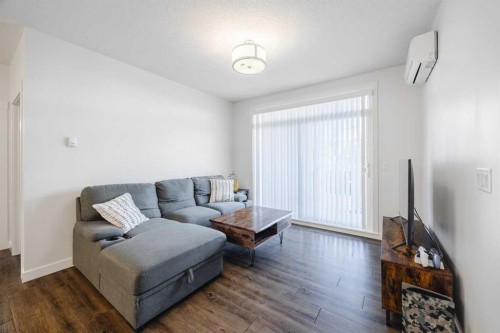 105-110 Auburn Meadows View Se, Calgary, AB - Indoor Photo Showing Living Room