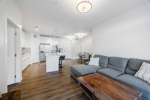 105-110 Auburn Meadows View Se, Calgary, AB - Indoor Photo Showing Living Room