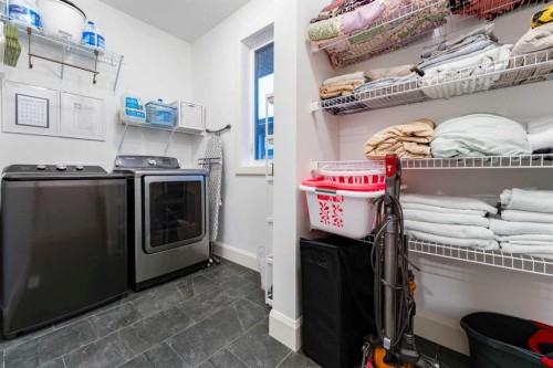 17 Cattail Run, Rural Rocky View County, AB - Indoor Photo Showing Laundry Room