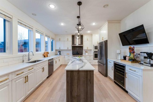 17 Cattail Run, Rural Rocky View County, AB - Indoor Photo Showing Kitchen With Upgraded Kitchen