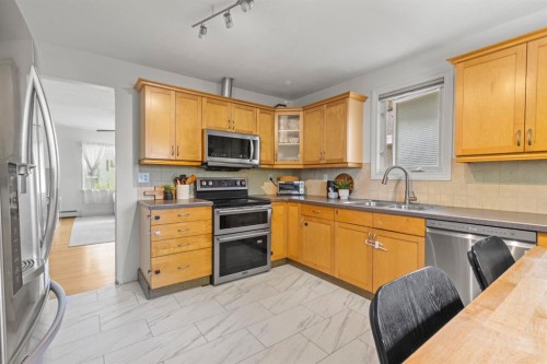2615 17A Street Sw, Calgary, AB - Indoor Photo Showing Kitchen With Stainless Steel Kitchen With Double Sink