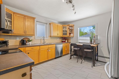 2615 17A Street Sw, Calgary, AB - Indoor Photo Showing Kitchen With Double Sink
