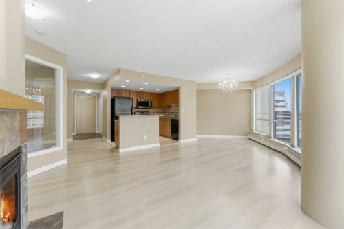 1302-1078 6 Avenue Sw, Calgary, AB - Indoor With Fireplace