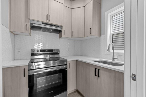 74 Lucas Place Nw, Calgary, AB - Indoor Photo Showing Kitchen With Upgraded Kitchen