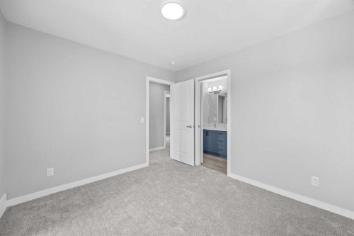 74 Lucas Place Nw, Calgary, AB - Indoor Photo Showing Other Room