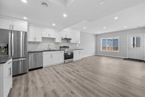 74 Lucas Place Nw, Calgary, AB - Indoor Photo Showing Kitchen With Upgraded Kitchen