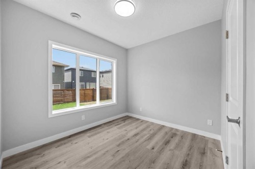74 Lucas Place Nw, Calgary, AB - Indoor Photo Showing Other Room